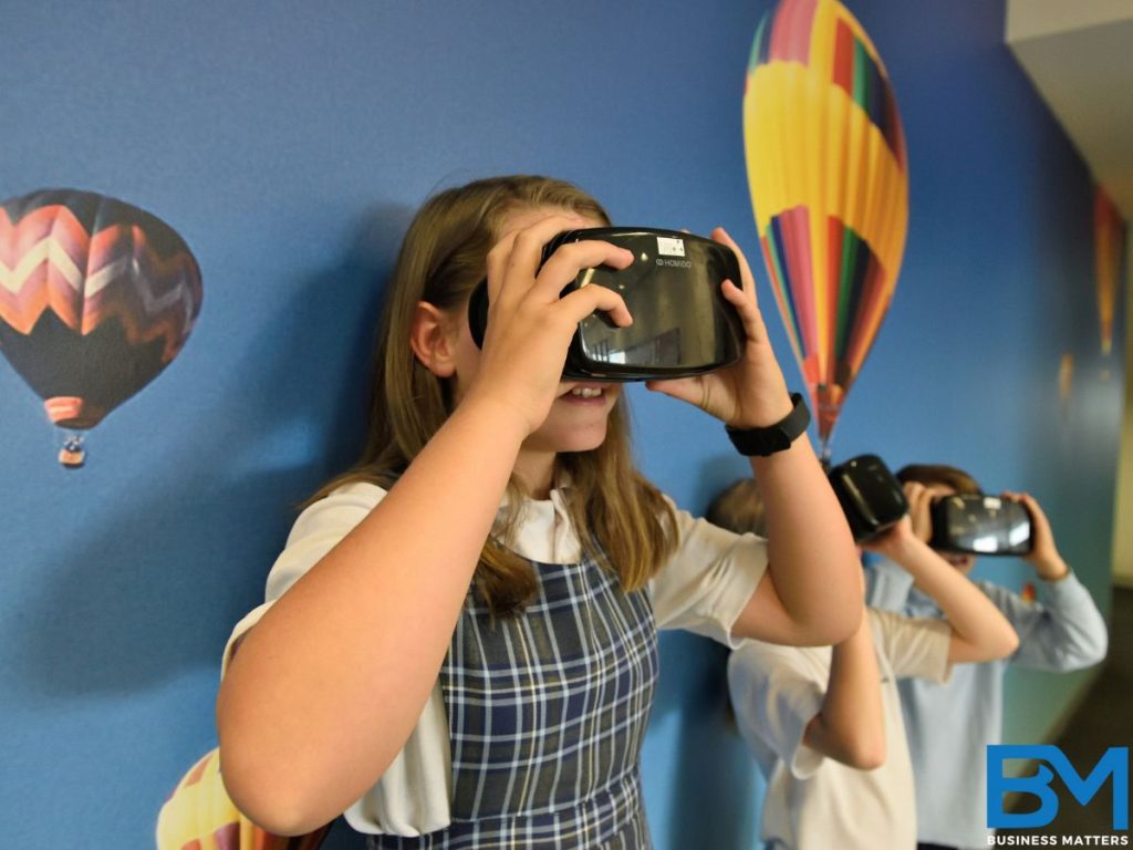 a school girl learning from VR showing the future of learning using AI