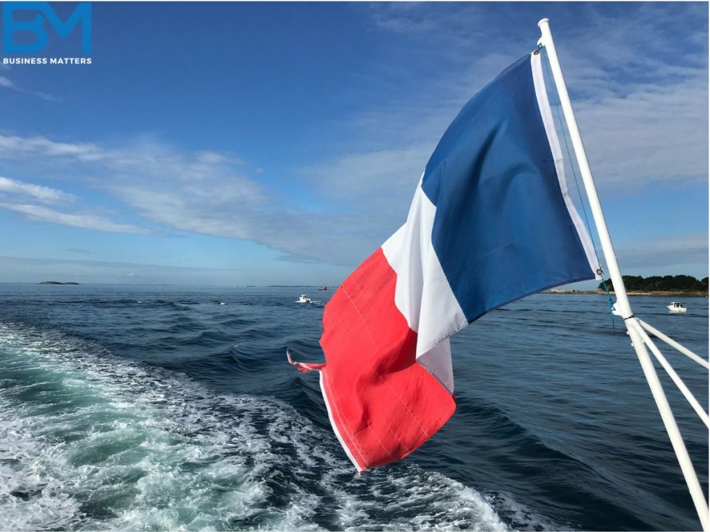 France National Flag on a pole in a Yatch in Middle of the Sea