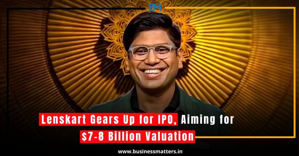 Lenskart CEO Peeyush Bansal smiling at the camera with a Yellow Curtain behind